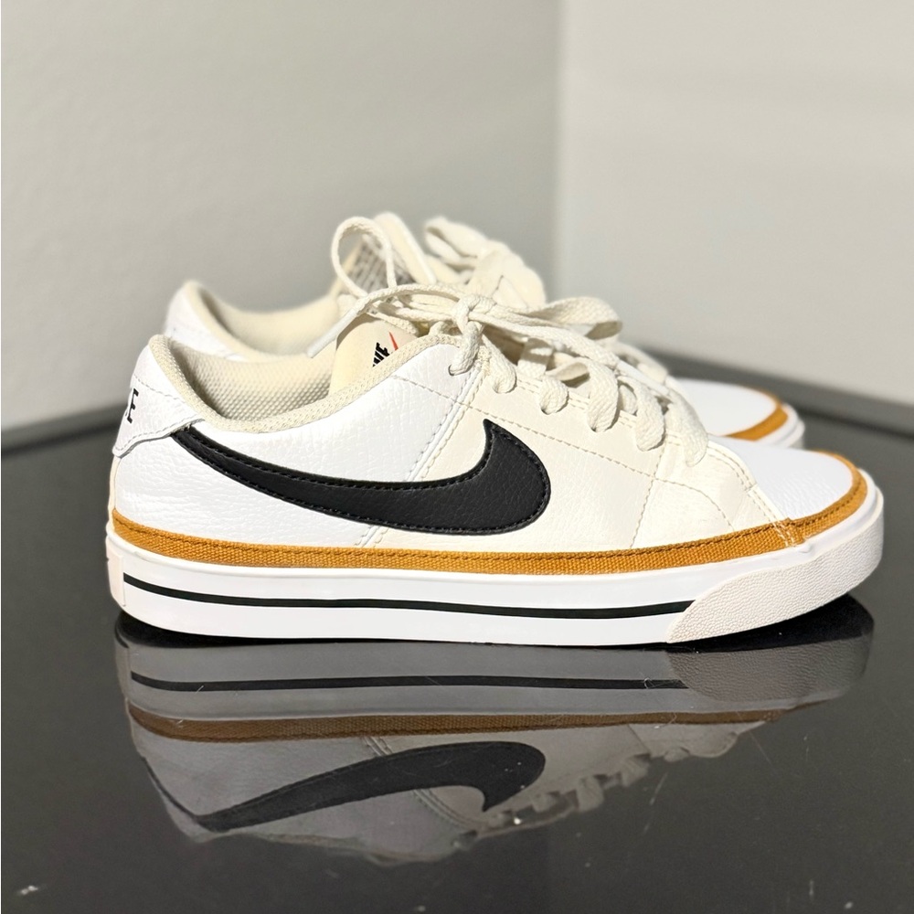 Nike Cream and Black Sneakers with Gold Trim
